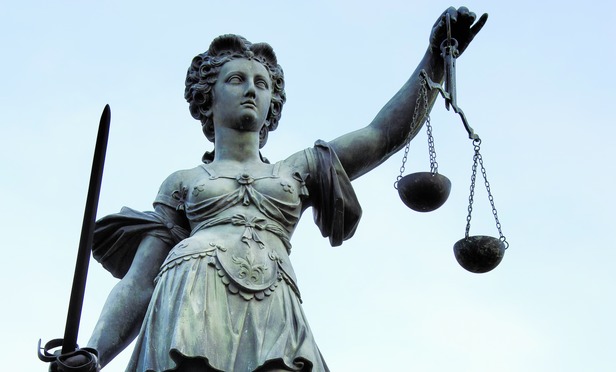 Lady Justice-Article-201403281133