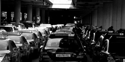 1280px-Taxi_Schiphol-1280x575