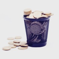 Trash bin with gold coins