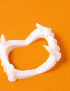 Close-up of fake plastic fangs for Halloween