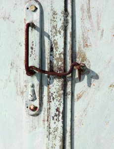 old metal pen with union hook on the gate.