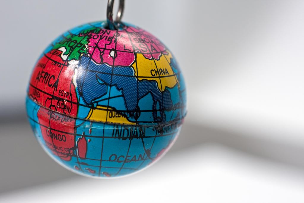 Old key chain in the shape of a small Earth globe