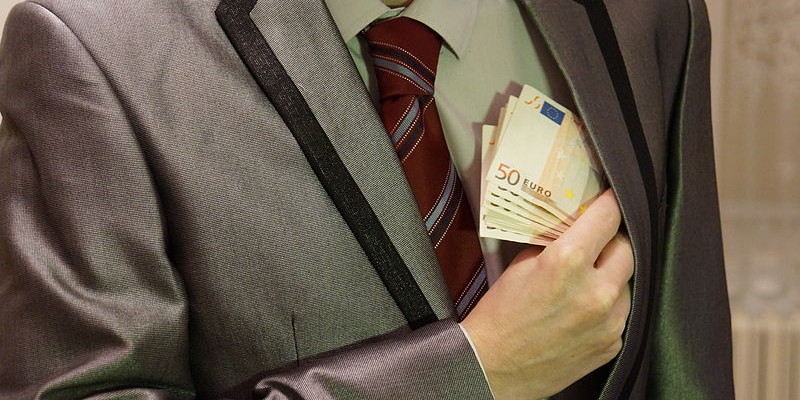 800px-4_-_corruption_-_man_in_suit_-_euro_banknotes_hidden_in_left_jacket_inside_pocket_-_royalty_free,_without_copyright,_public_domain_photo_image