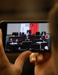 polish-parliament-sejm-kaczynski-right-phone