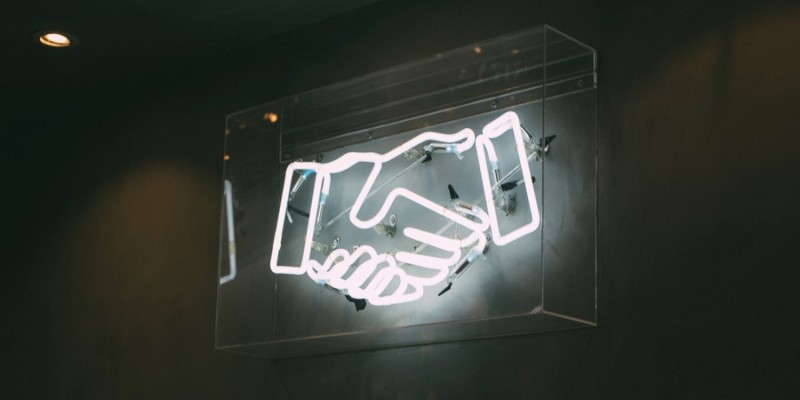together-hands-neon