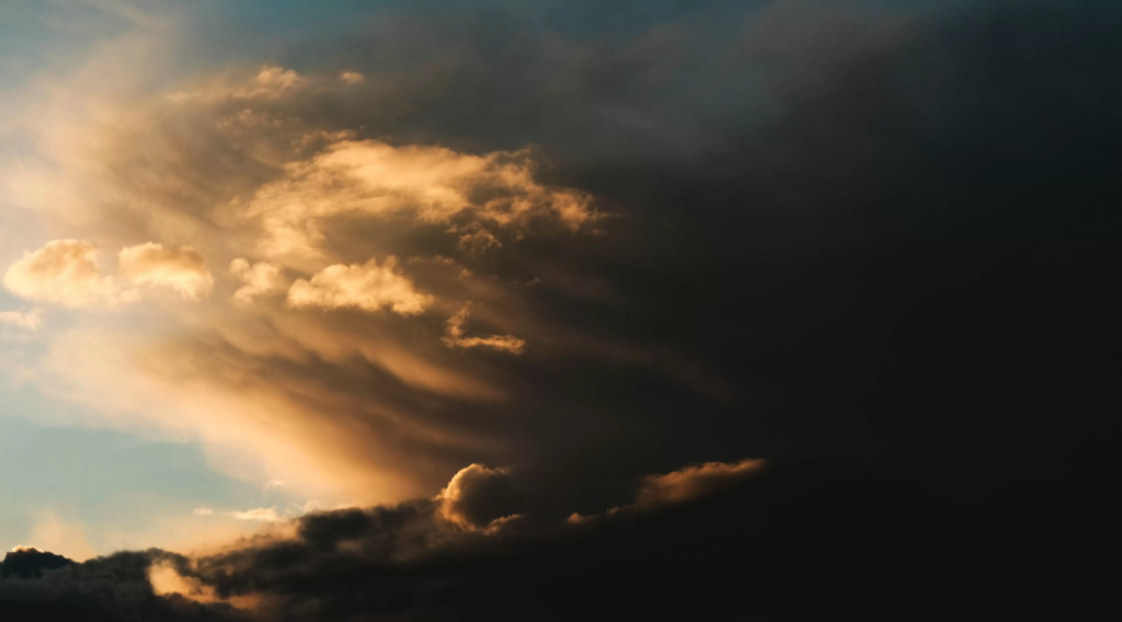 Portuguese Sun Amidst Stormy Clouds